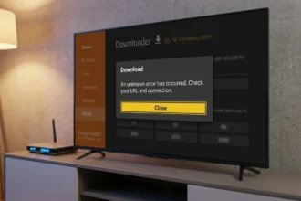 Schermo TV che mostra l'errore di connessione dell'app Downloader su Amazon Fire TV Stick con un router accanto